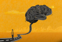 What are the 5 Physical Symptoms of Stress? The man standing on a road and looking at the big brain-shaped knot. Stress and its physical symptoms