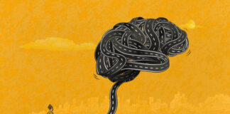 The man standing on a road and looking at the big brain-shaped knot. Stress and its physical symptoms