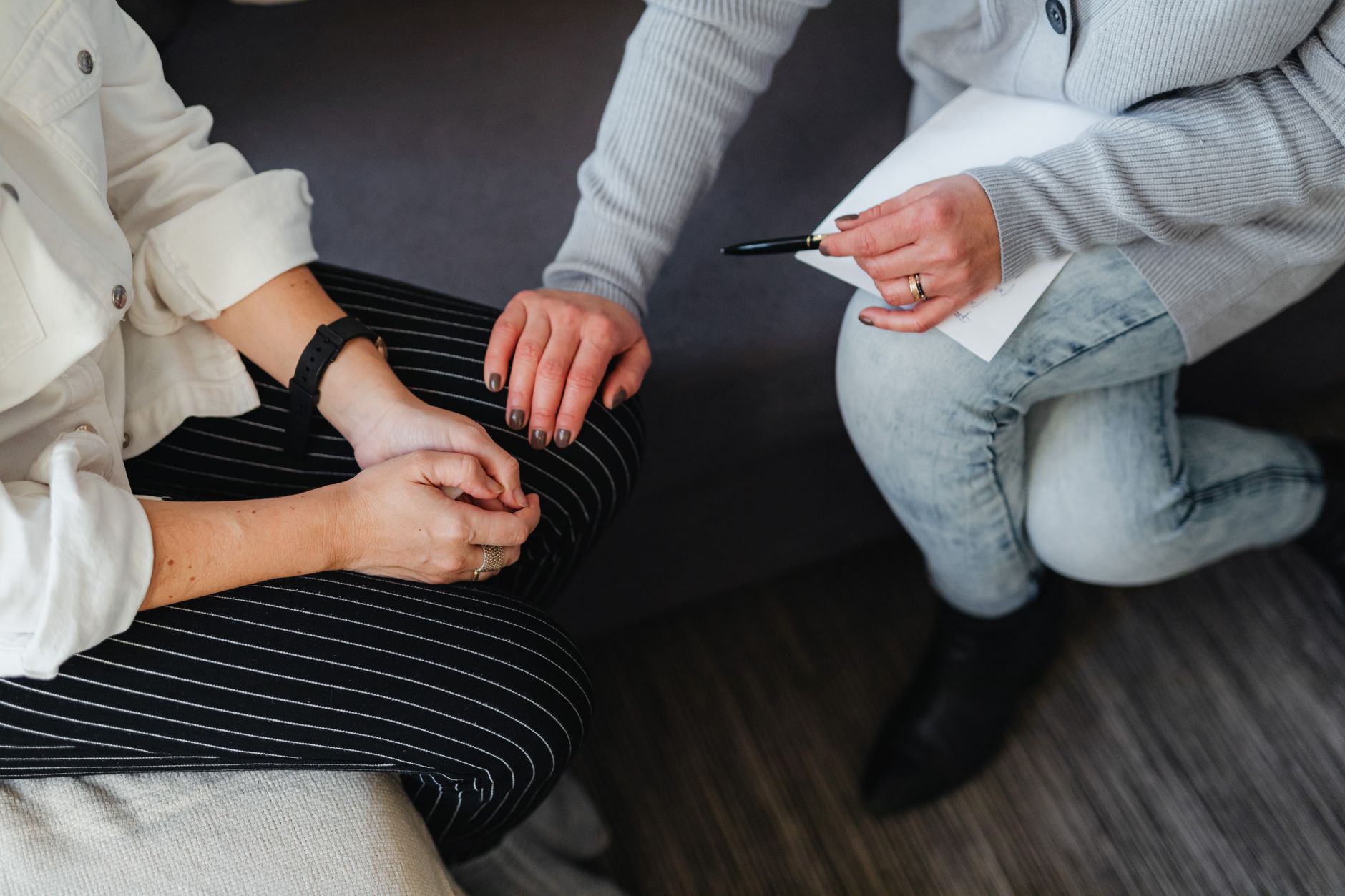 A doctor explaining the link between depression and chronic pain to a patient.