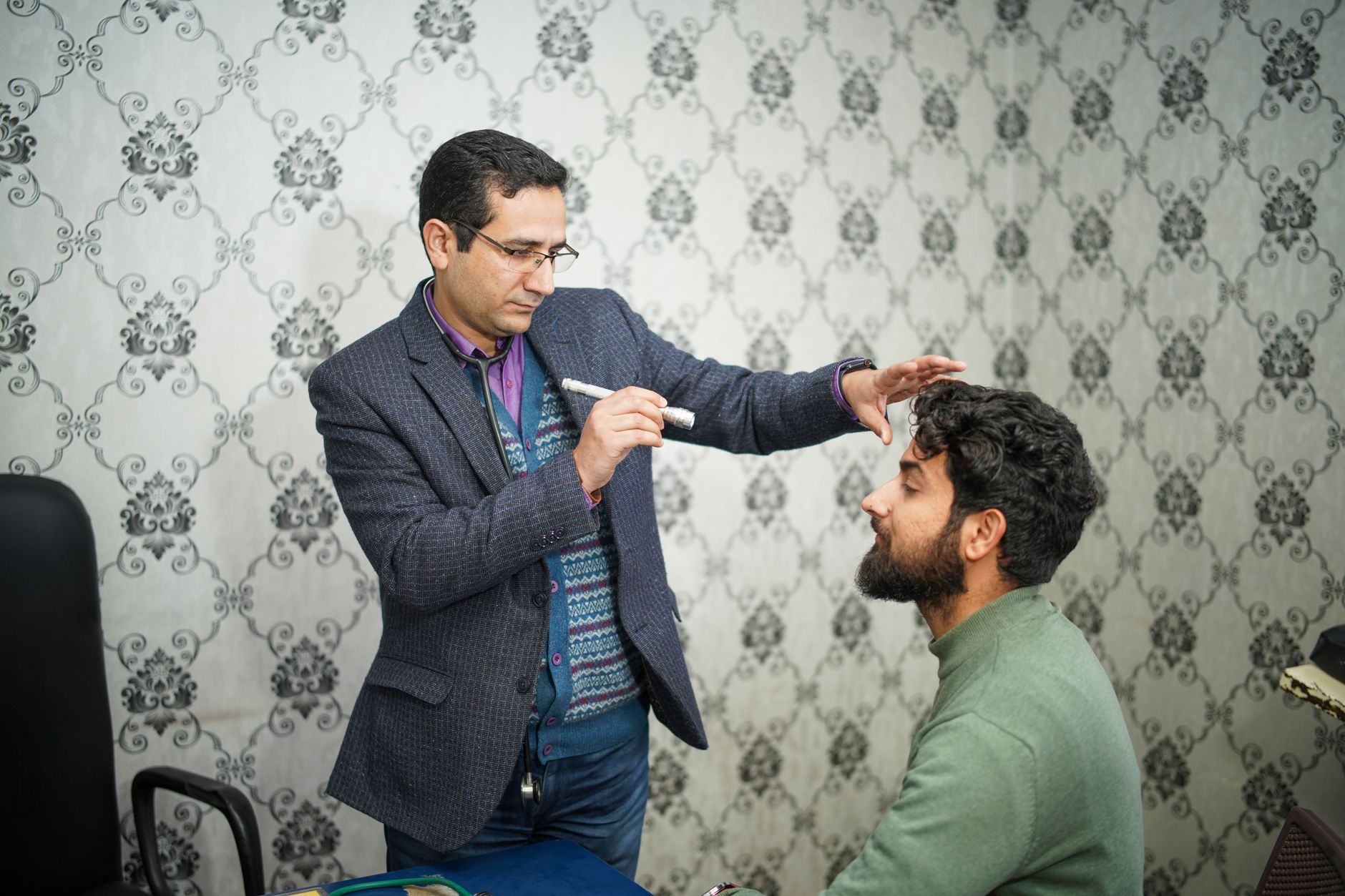 A patient reviewing blood sugar data before a diabetes doctor appointment with their provider.