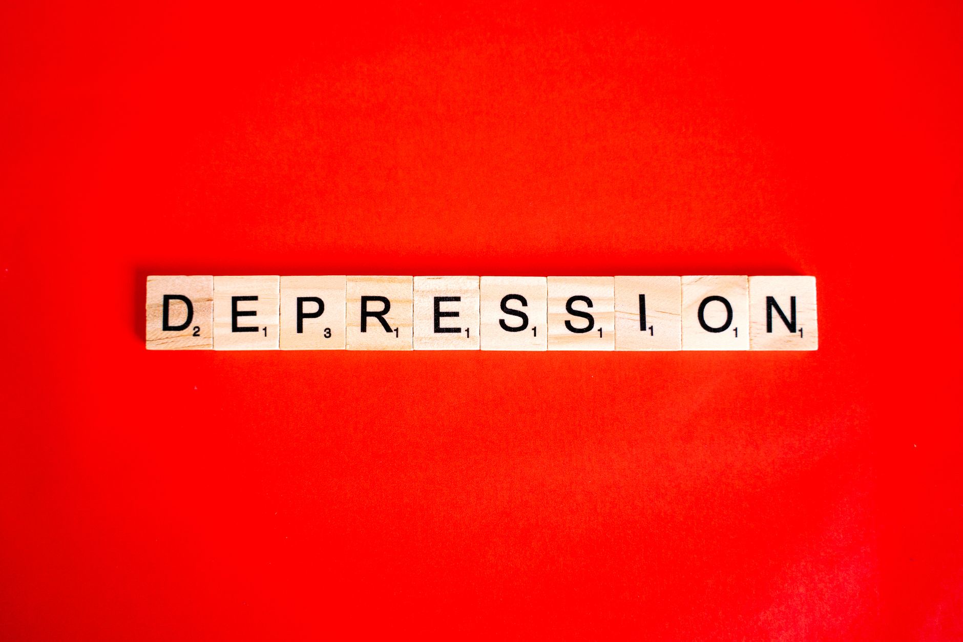 A friendly doctor discussing a care plan for major depressive disorder with a patient.