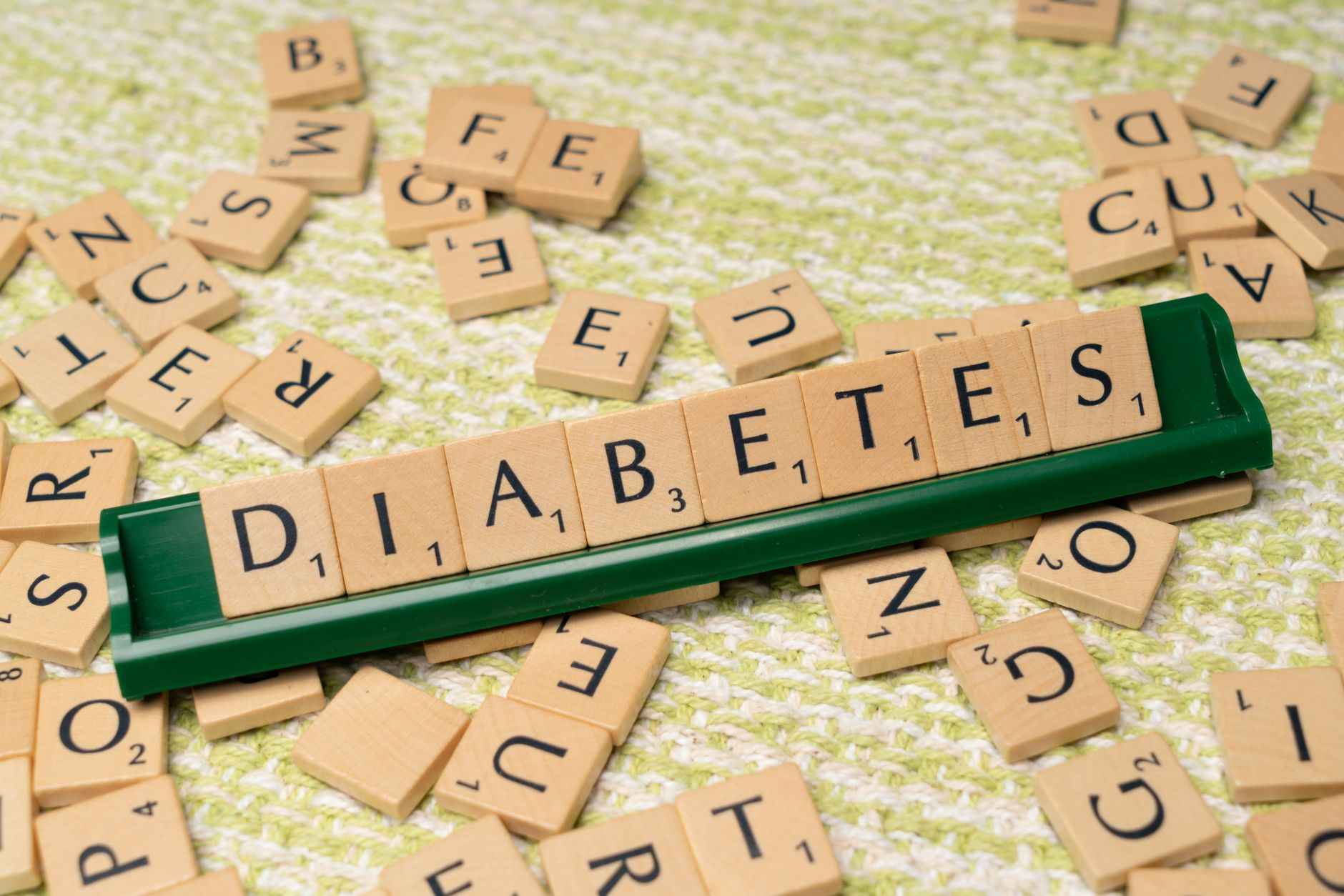 A woman walking in a park to help manage blood sugar after gestational diabetes.